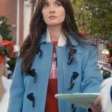 a-90s-christmas-2024-eva-bourne-blue-jacket