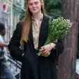 a-complete-unknown-elle-fanning-black-coat