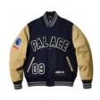 palace-x-gore-tex-going-further-black-and-gold-varsity