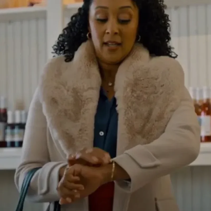 tamera-mowry-housley-scouting-for-christmas-shearling-coat